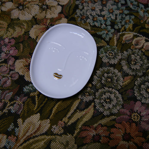RÄDER – Vide-poche visage en porcelaine blanche